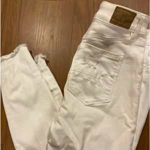 American Eagle White Stretch Distressed Jeans Size 4